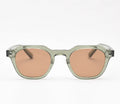 Juniper sunglasses in translucent sage green with warm brown lenses