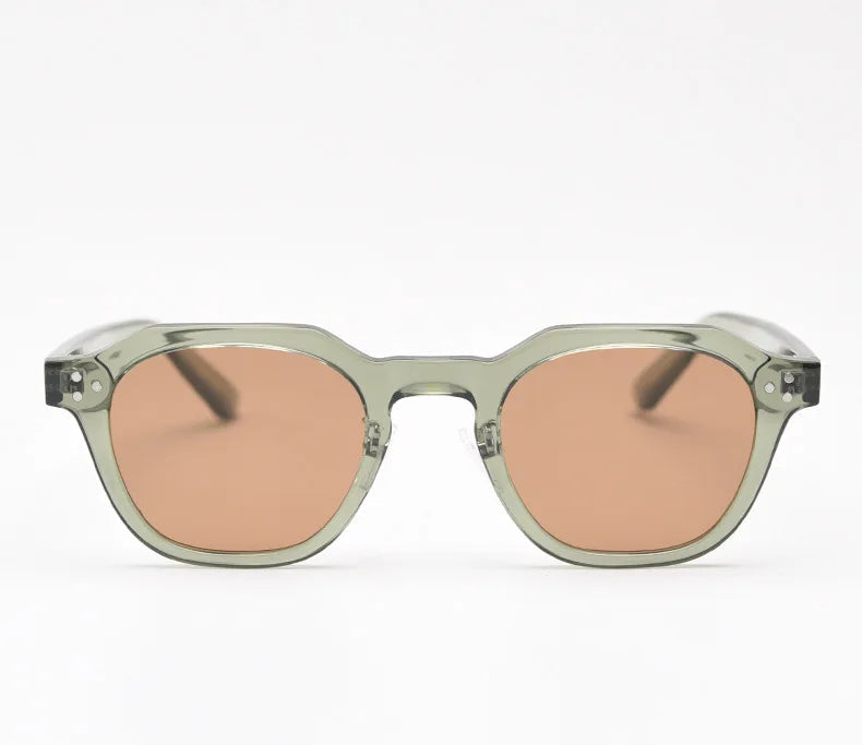 Juniper sunglasses in translucent sage green with warm brown lenses